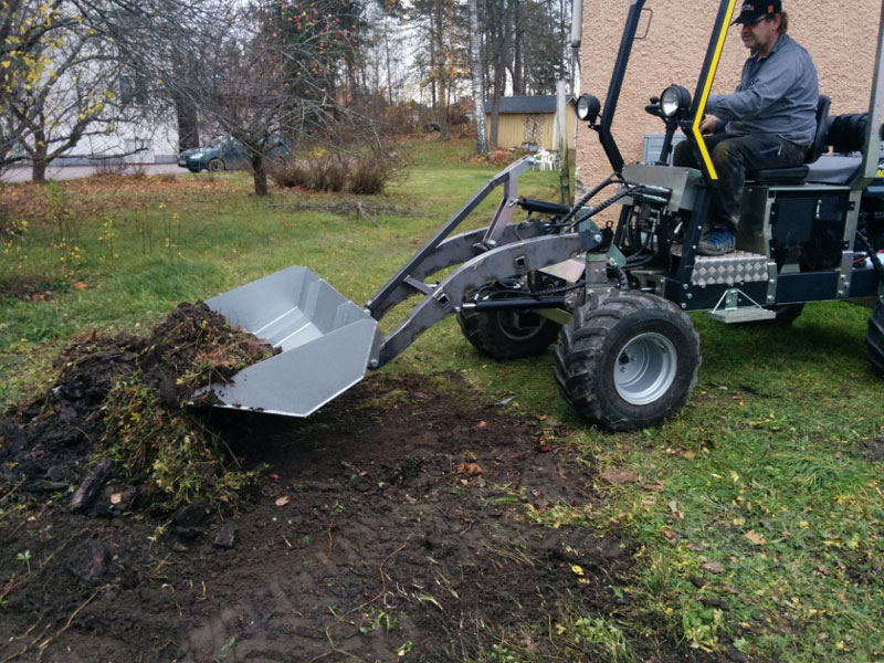 Grävskopa på MacTrac